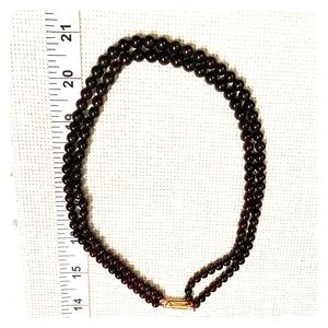 Double strand Garnet necklace.
